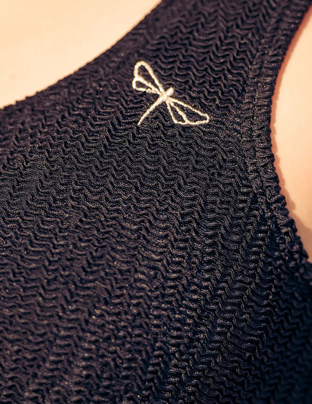 Crinkle bikini bra, swimwear top - Grace with a close-up of unique texture and delicate embroidery detail.